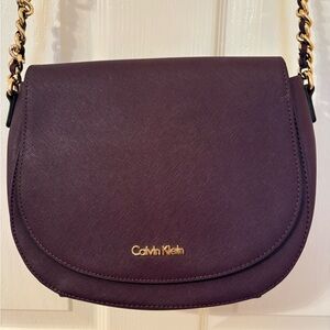 Calvin Klein Deep Plum Crossbody Saddle Bag with Gold Chain